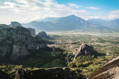 Scenic view of landscape and mountains against sky