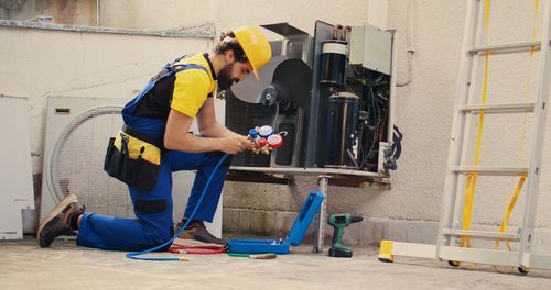 Low section of man working at construction site