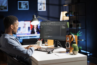 Man using laptop at office