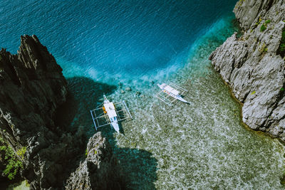 High angle view of rock formation in sea