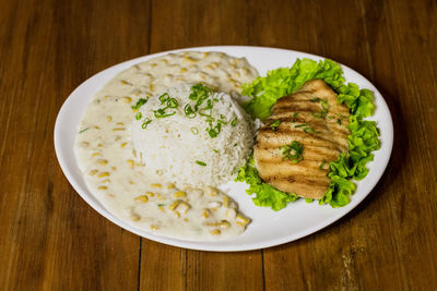 High angle view of breakfast served on table