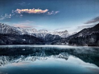 Scenic view of lake against mountain range