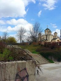 Built structure against cloudy sky