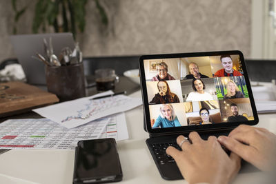 Person having video call on digital tablet