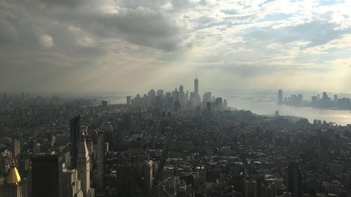 Aerial view of cityscape against sky