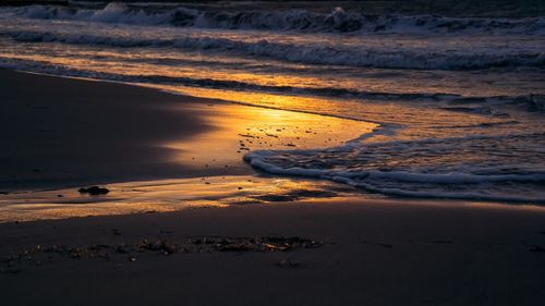 Scenic view of sea at sunset