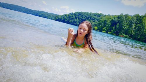 Girl lying on beach 