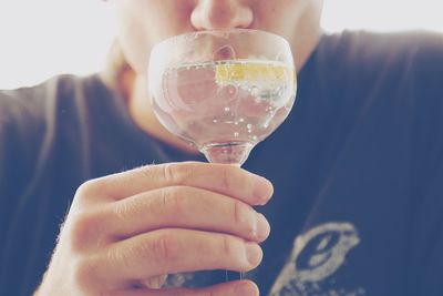 Close-up of woman holding drink