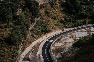 High angle view of road amidst trees