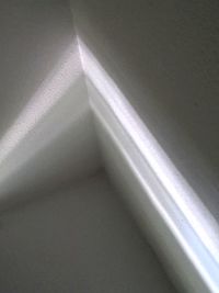 High angle view of sunlight falling on wall at home