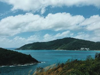 Scenic view of sea against cloudy sky