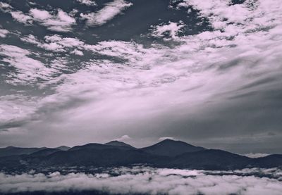 Scenic view of mountains against sky during winter