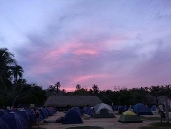 View of tent against cloudy sky