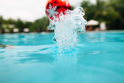 Close-up of water splashing in swimming pool