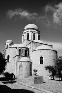 Low angle view of bell tower against sky