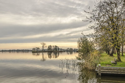 Scenic view of lake against sky during sunset