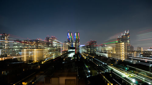Stunning view on the shinjuku skyline while zooming out creating awesome light trail effects