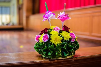 Close-up of pink flower pot on table