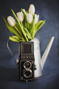 Close-up of camera on table