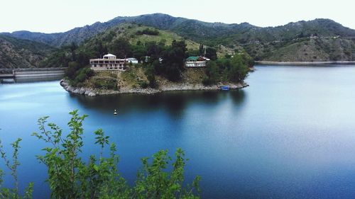 Scenic view of lake with mountains in background