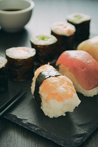 Sushi set sashimi rolls served