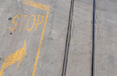 High angle view of text on road