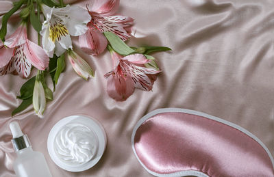 High angle view of pink roses on table