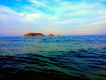 Scenic view of sea against sky during sunset