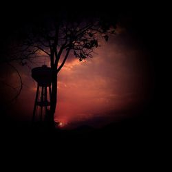 Silhouette tree against sky at sunset