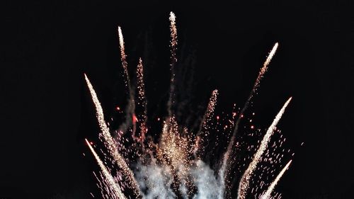 Firework display at night