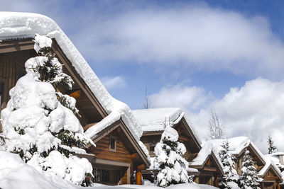 Low angle view of building against sky during winter