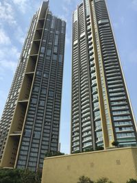 Low angle view of modern buildings against sky