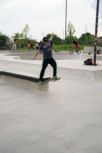 Full length of man skateboarding on skateboard