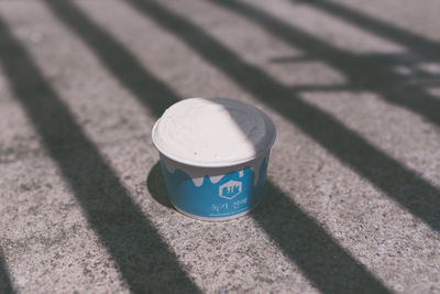 High angle view of coffee cup on table