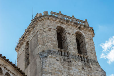 Low angle view of old building against sky