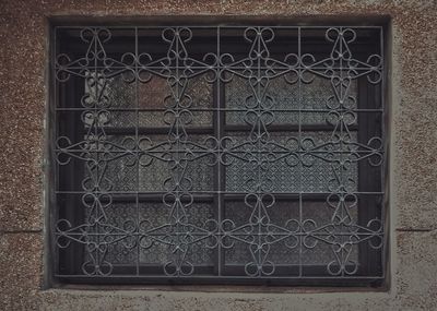 Metal grate on window