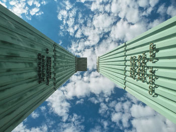 Low angle view of cables against sky