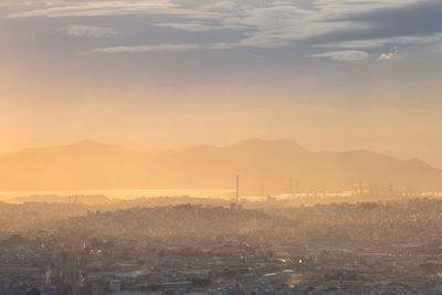 Scenic view of mountains against sky during sunset