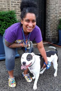 Portrait of happy woman with dog