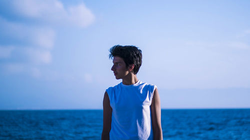 Portrait of young woman in sea