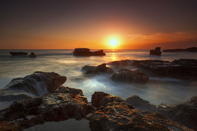 Scenic view of sea during sunset