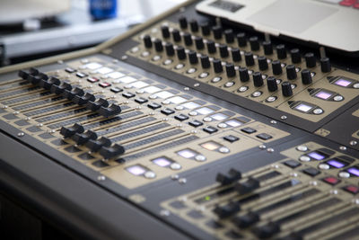 Close-up of sound mixer at recording studio