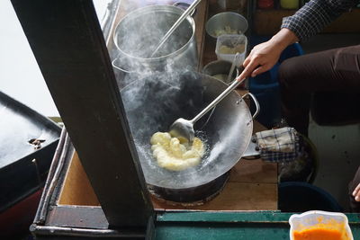 Midsection of person preparing food