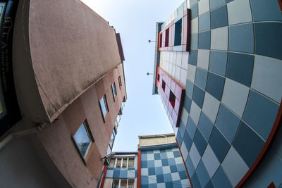 Low angle view of buildings against clear sky