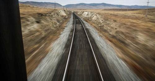 Blurred motion view of railroad tracks