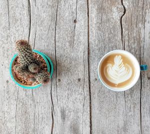 High angle view of coffee cup on table