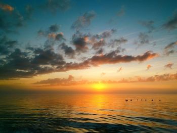 Idyllic shot of sea against sky during sunset