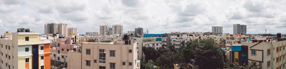 Panoramic view of buildings against sky