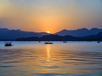 Scenic view of sea against sky during sunset