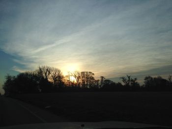 Scenic view of landscape against sky during sunset